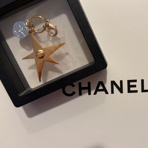 CHANEL Gold Star gift with purchase charm